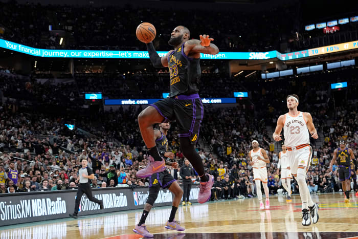 Dec 15, 2023; San Antonio, Texas, USA; Los Angeles Lakers guard LeBron James (23) goes up for a dunk during the second half against the San Antonio Spurs at Frost Bank Center.